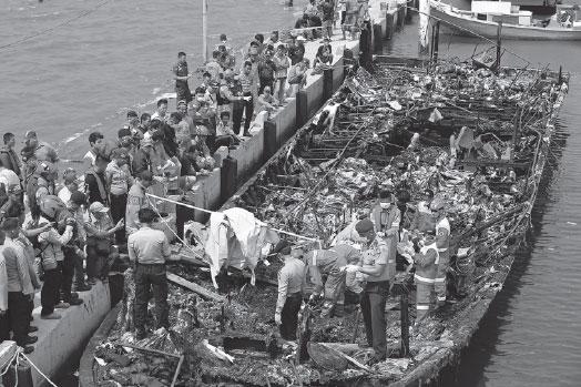 At least 23 killed after ferry catches fire