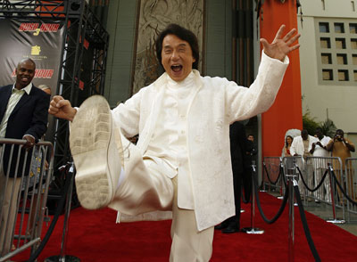 Cast member Jackie Chan throws a kick at the premiere of