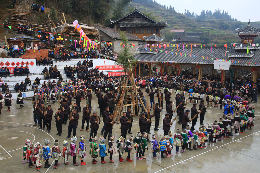 Dong people perform for traditional New Year festival